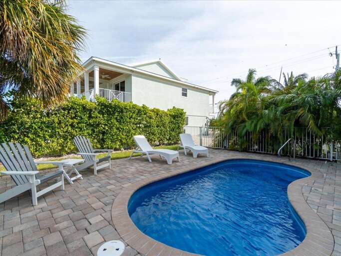 Take a refreshing dip in the sparkling pool, the perfect place to relax and soak up the sun. Take a refreshing dip in the sparkling pool, the perfect place to relax and soak up the sun.