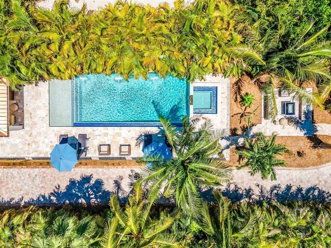 Escape and relax by the resort style pool