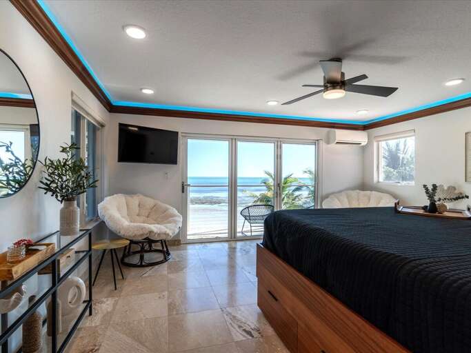 Grand Suite bedroom wtih a breathtaking panorama of the Atlantic Ocean.