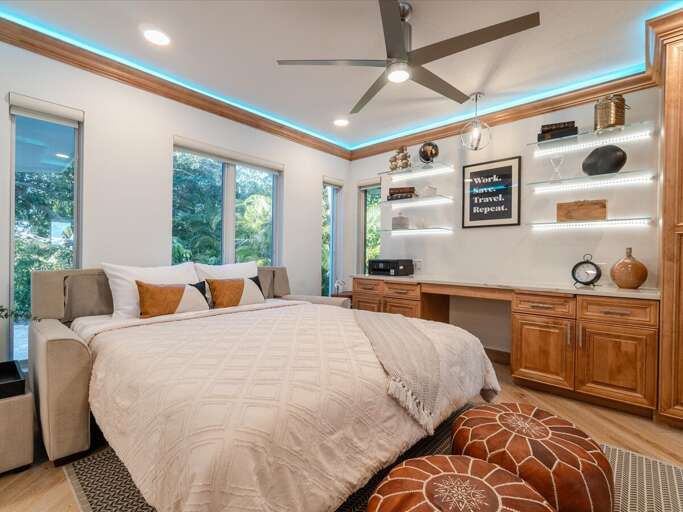 Main Suite office workspace with an American Leather Queen-plus pullout bed.