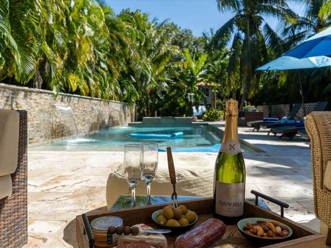 Plunge into this relaxing salt water pool with waterfalls.