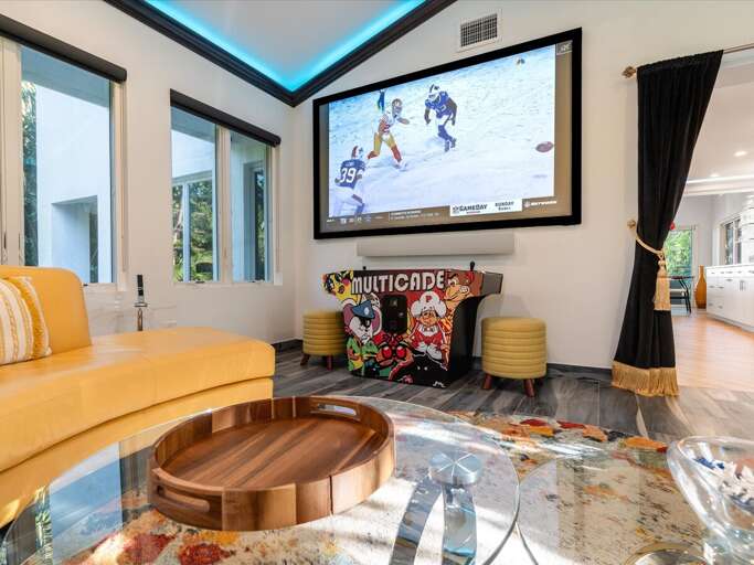 Unwind in the entertainment room with your favorite movie or game.