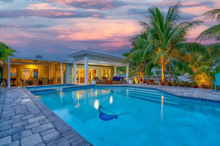 With its crystal-clear waters and coastal views, this resort-style pool delivers the luxury