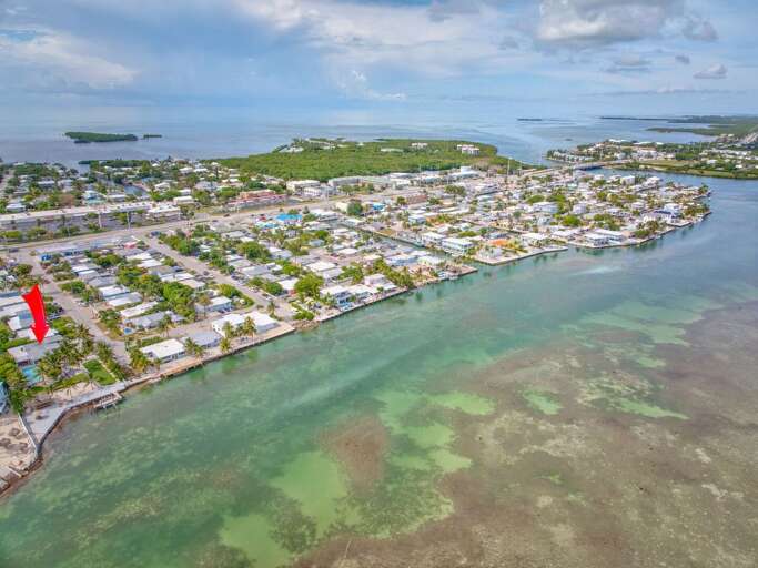 Experience breathtaking panoramic ocean views from multiple vantage points throughout this luxury Florida Keys rental, offering unmatched coastal beauty and tranquility.