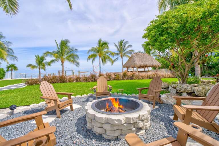 Gather around the oceanfront fire pit to enjoy warm evenings under the stars, perfect for storytelling, roasting marshmallows, and relaxing in the Florida Keys.