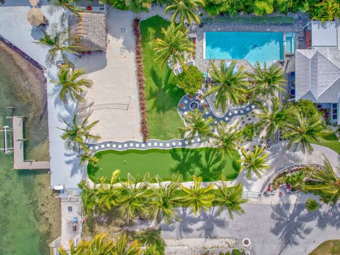 This spacious private yard offers sweeping views of the ocean, surrounded by tropical landscaping This spacious private yard offers sweeping views of the ocean, surrounded by tropical landscaping