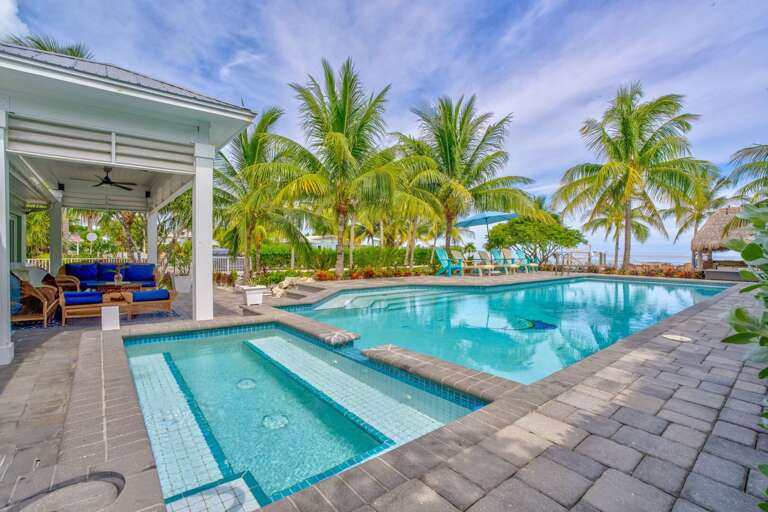 Swim and unwind in your own private oceanfront pool surrounded by lush tropical landscaping. This Swim and unwind in your own private oceanfront pool surrounded by lush tropical landscaping. This
