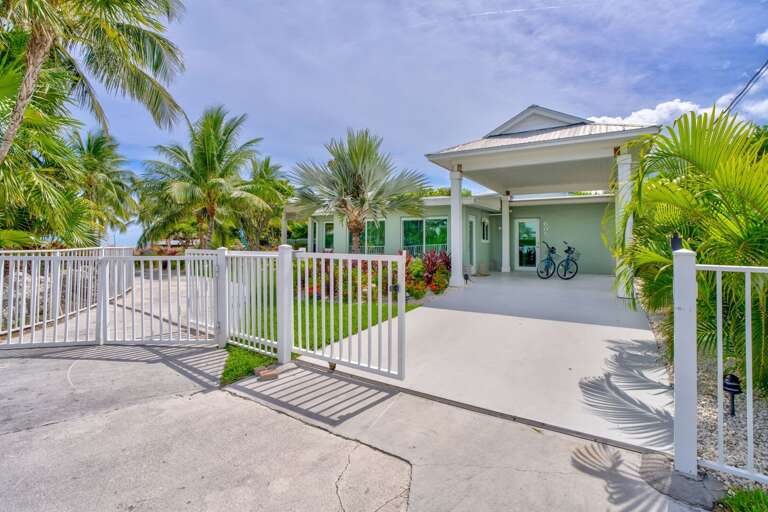 This vacation rental offers ample parking space including dedicated trailer parking, perfect for boaters and outdoor enthusiasts visiting Marathon, Florida Keys.