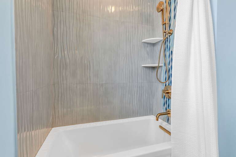 Well-appointed third-floor shared bathroom with stylish design and convenience, ideal for families and groups in this luxury Marathon waterfront rental.