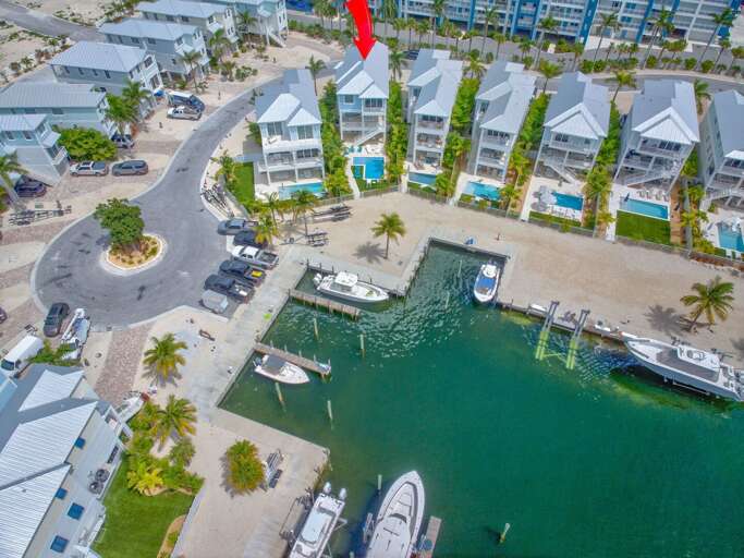 Bird's-eye view of this stunning modern retreat on the water, offering the perfect blend of privacy and coastal luxury.