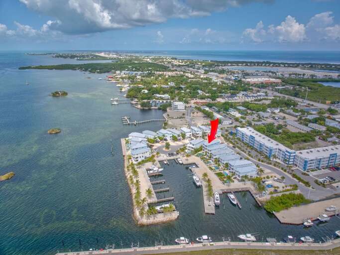 This high-end Florida Keys rental features luxury design, a private dock, and breathtaking oceanfront sunsets.