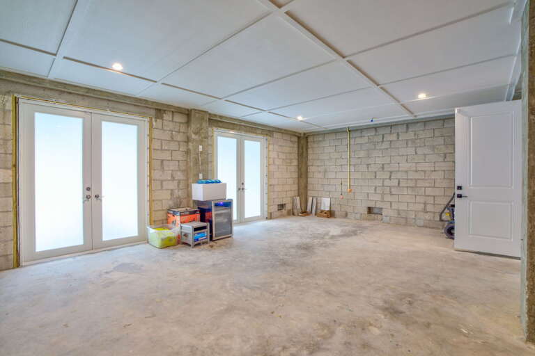 Large garage providing secure parking and ample storage for vehicles and gear in this upscale Marathon Florida Keys rental home.