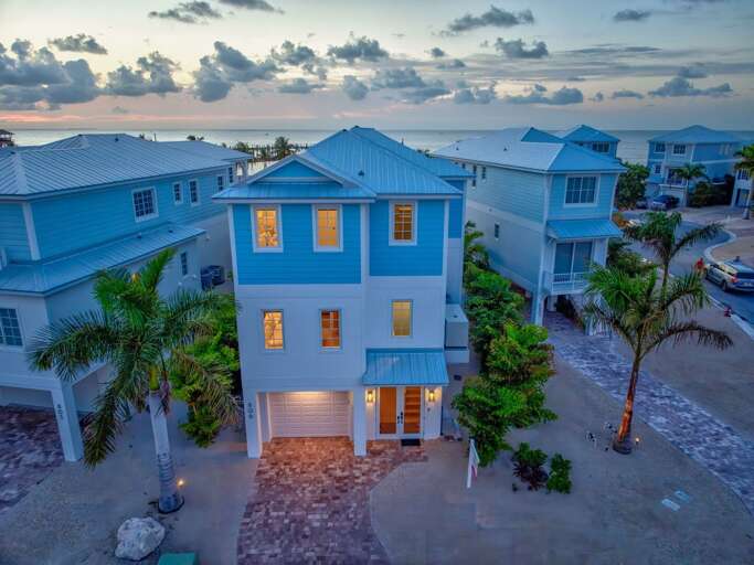 Perfect for group getaways, this 5-bedroom luxury retreat in Marathon features panoramic water views and resort-style amenities.