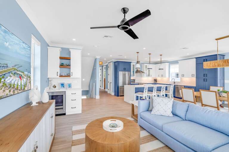 Relax in this spacious living room with stunning Gulf views, high ceilings, and upscale furnishings. Perfect for group gatherings in your waterfront Florida Keys vacation home.