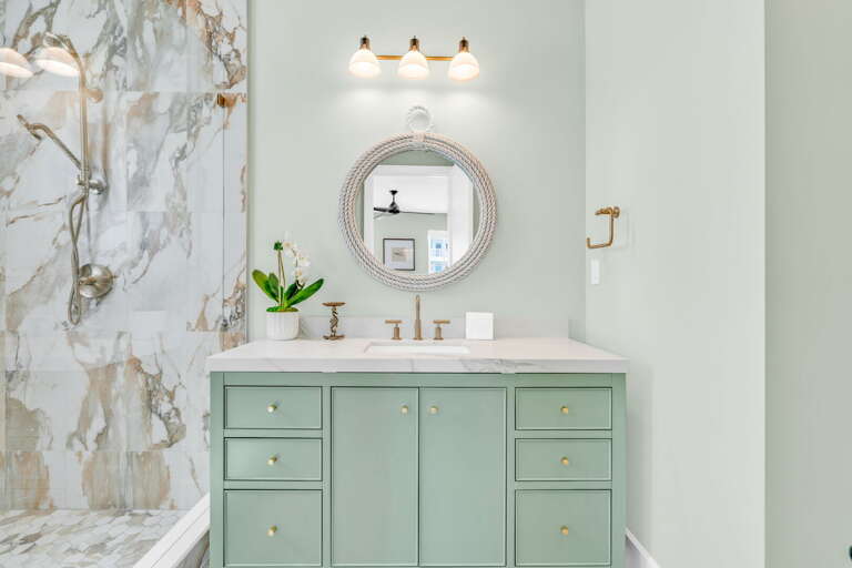 Stylish and well-appointed ensuite bathroom on the second level, featuring contemporary fixtures and full amenities in this luxury Florida Keys vacation rental.