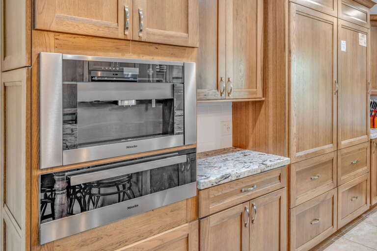 Gourmet kitchen in a Marathon FL vacation rental featuring a built-in espresso machine for coffee lovers and a luxury stay experience. Gourmet kitchen in a Marathon FL vacation rental featuring a built-in espresso machine for coffee lovers and a luxury stay experience.