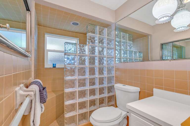 Private guest ensuite bathroom featuring a walk-in shower in a luxury Florida Keys vacation rental. Private guest ensuite bathroom featuring a walk-in shower in a luxury Florida Keys vacation rental.