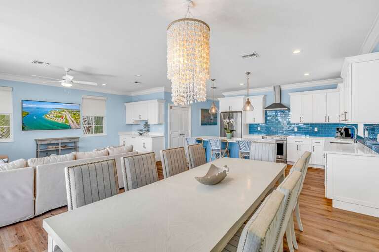 Dine with family or friends at this Marathon FL vacation home, featuring seating for 10 and unobstructed Gulf and Atlantic views for a memorable Florida Keys getaway.