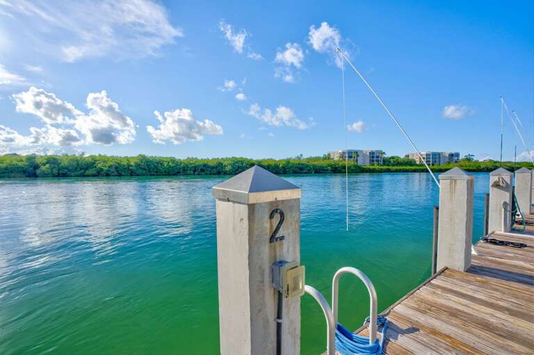 Dock your boat with ease at this waterfront Marathon FL rental, featuring power, water, and direct access to the Gulf and Atlantic waters.