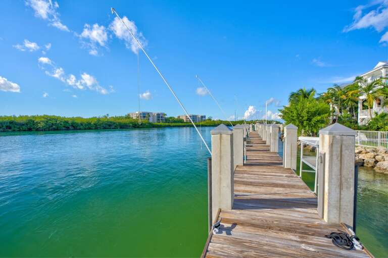 Enjoy easy access to fishing, boating, and water adventures from your private dock at this luxury Florida Keys vacation home.
