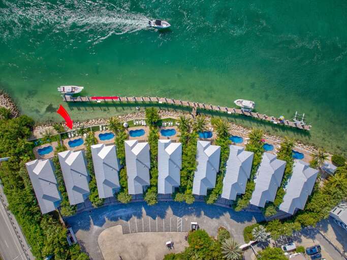 Relax poolside or enjoy the private dock with direct access to fishing, boating, and water adventures in this luxury rental.