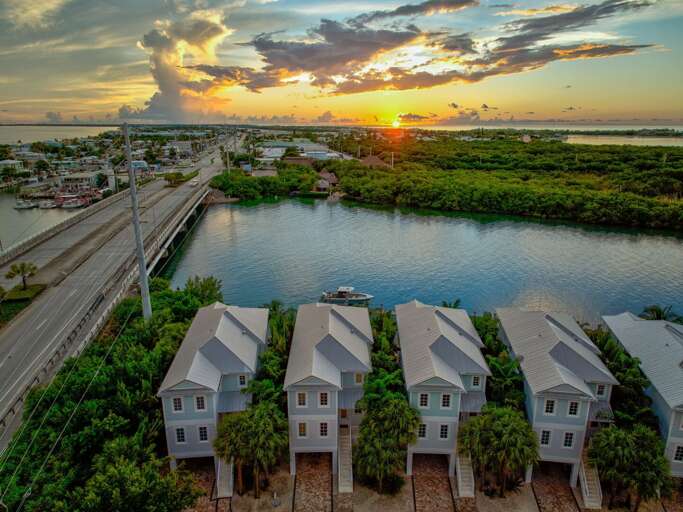 Soak in the heated pool and hot tub while enjoying spectacular water views from this Florida Keys vacation home.