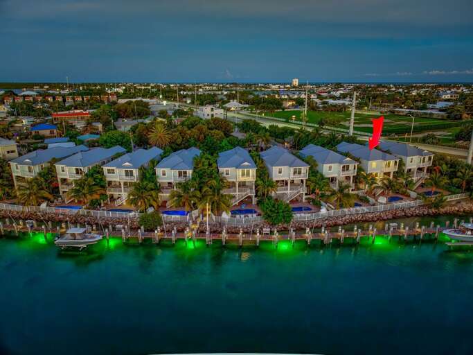 Take in sweeping Gulf and Atlantic vistas from every level of this Marathon FL oceanfront rental.