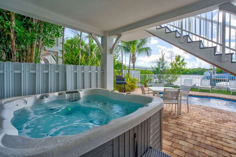 Unwind in the private hot tub with sweeping Gulf and Atlantic views, perfect for evening relaxation at this Marathon FL waterfront rental.