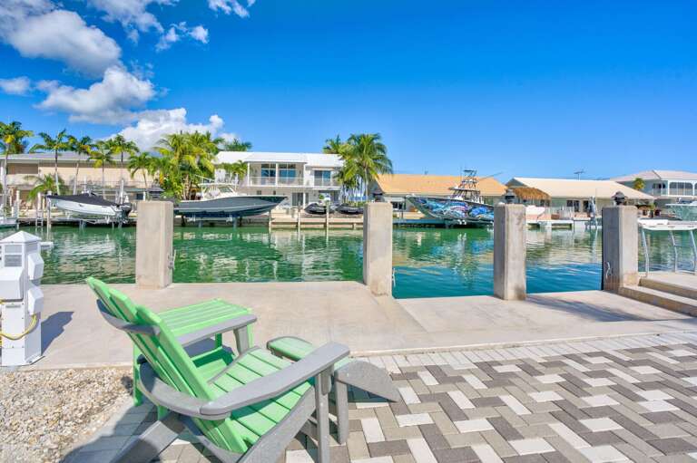 Dock and boat lift for boating enthusiasts at Key Colony Beach Florida Keys waterfront vacation rental.