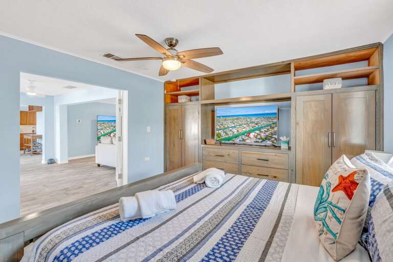 Spacious master bedroom with king bed and tropical décor in single-story  Key Colony Beach Florida Keys vacation rental. Spacious master bedroom with king bed and tropical décor in single-story  Key Colony Beach Florida Keys vacation rental.