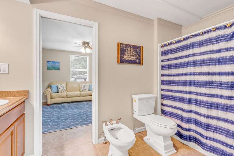 Comfortable one-bedroom suite complete with ensuite bath and sitting area, ideal for guests wanting privacy in a waterfront Marathon rental.