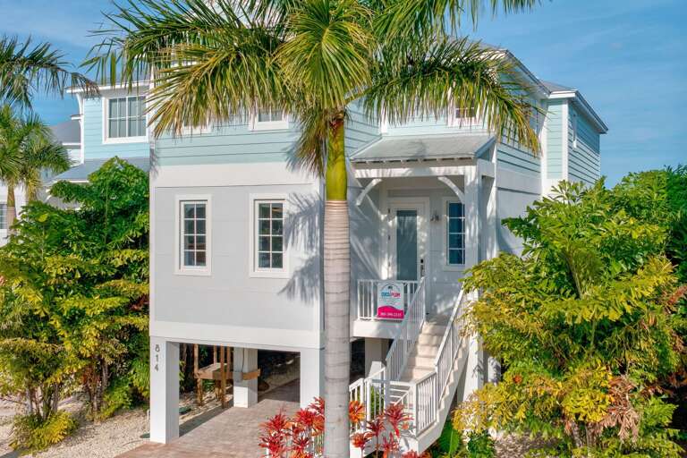 Exceptional luxury vacation home with a heated private pool located inside an exclusive Marathon FL