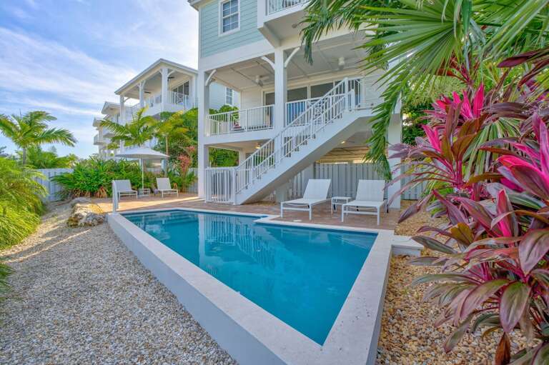 Exceptional luxury vacation home with a heated private pool located inside an exclusive Marathon FL
