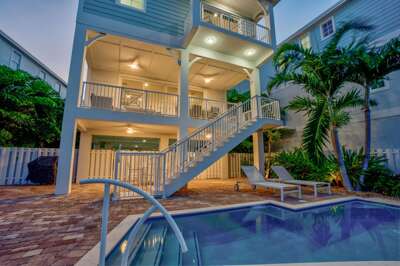 Exceptional luxury vacation home with a heated private pool located inside an exclusive Marathon FL