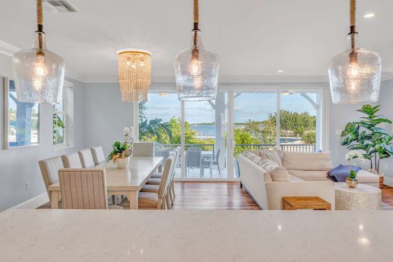 Stylish waterfront kitchen with premium cabinetry and canal views. Ideal for guests who love