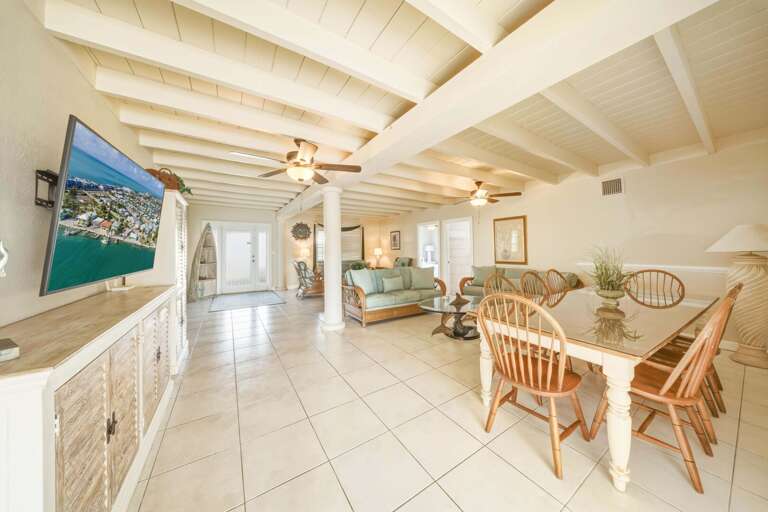 Bright dining area in a luxury Marathon FL vacation rental designed for gathering with family and friends.