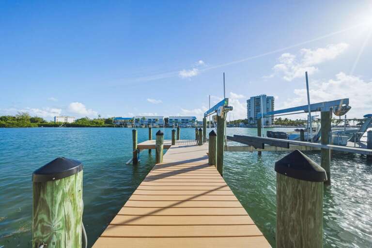 Canal-front dock in a Marathon Florida Keys vacation home perfect for fishing and boating adventures.