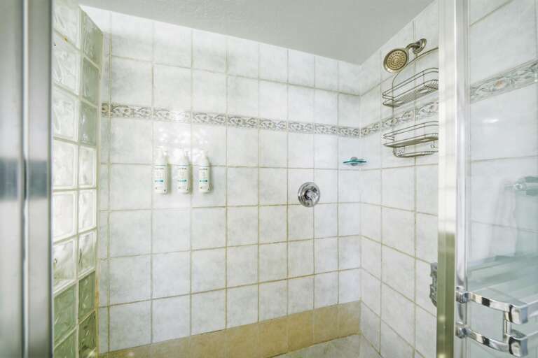 Ensuite bath with jetted tub in a Florida Keys vacation rental designed for ultimate relaxation.
