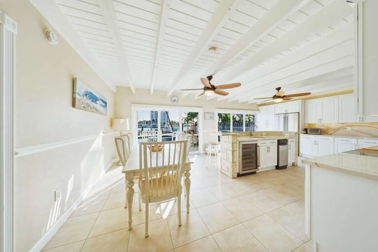 Stylish kitchen in a Marathon Florida waterfront home with private pool and dock, ideal for cooking and entertaining during your Keys getaway.