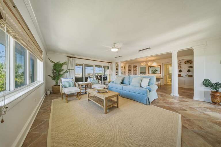 Enjoy a comfortable living area complete with Smart TV, DVD player, board games, and books—perfect for family time after exploring Marathon FL and nearby beaches.