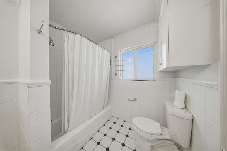 Enjoy extra space and convenience with dual sinks in this well-appointed master bathroom.