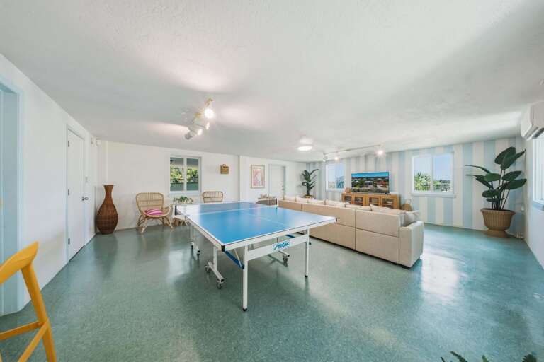 Enjoy friendly competition with a ping pong table in the bonus game room, perfect for families and groups staying in Marathon FL.