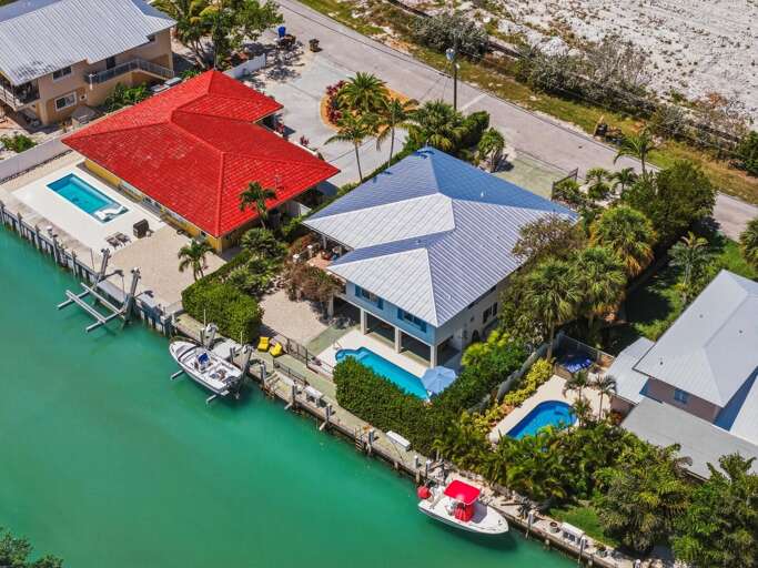 This Marathon FL vacation home offers the perfect setup for families, with a private pool, dock, and plenty of space to relax and unwind.