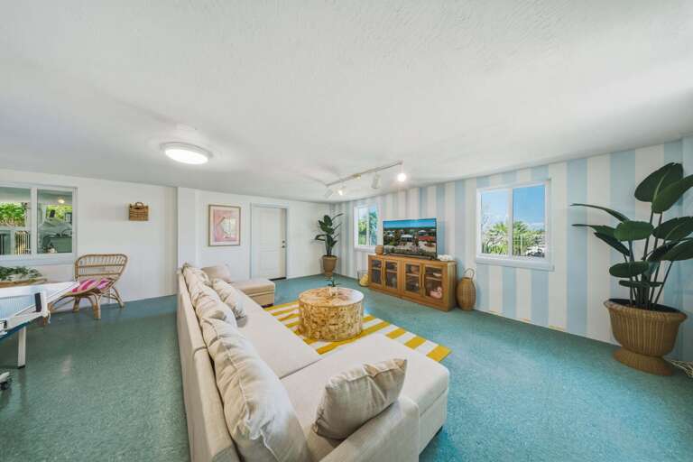 A perfect retreat for kids and adults alike, this downstairs space adds extra room to spread out and enjoy your Florida Keys getaway.