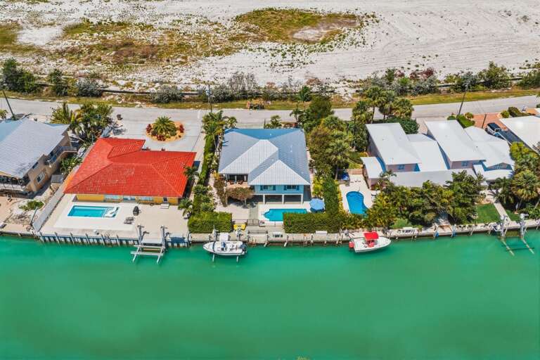 Welcome to your private Florida Keys getaway in Marathon FL, offering a pool, dock, and outdoor living just minutes from Sombrero Beach.
