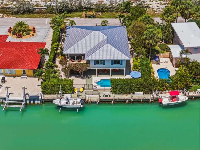 Welcome to your private Florida Keys retreat, ideally located near Sombrero Beach in Marathon FL with outdoor living spaces and waterfront access.