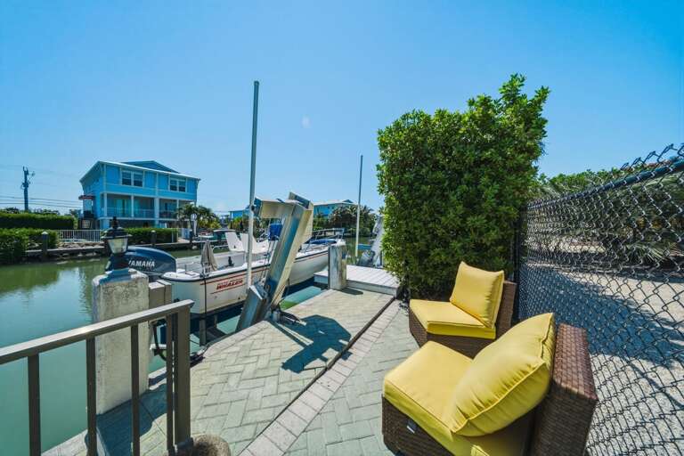 Relax by the water and take in peaceful canal views from your private dock during your Marathon Florida Keys stay.