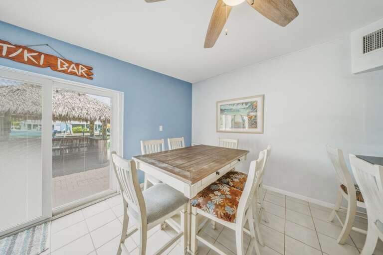 Enjoy shared meals and easy conversation in the open dining area, perfectly suited for group stays at this 3-bedroom Key Colony Beach vacation rental.