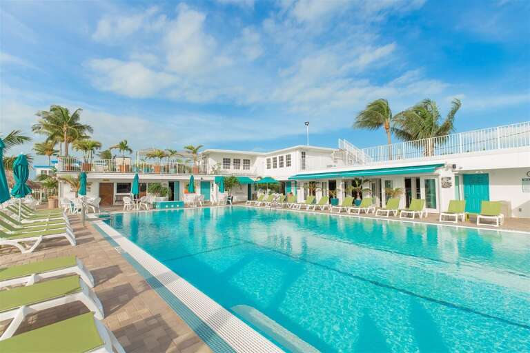 Guests have access to the Cabana Club's pool, a favorite amenity for relaxing, swimming, and enjoying the private club atmosphere of Key Colony Beach.
