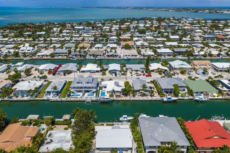 Guests enjoy access to the Key Colony Beach Cabana Club, including a private beach, pool, dining, and bar — one of the most sought-after perks in Key Colony Beach.